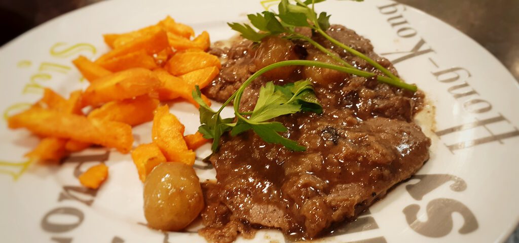 Receta de escalopines con salsa de uvas